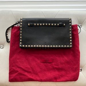 Valentino rockstud clutch bag with wrist strap